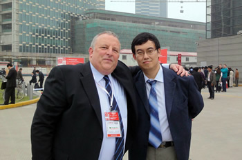 Frank Wilson, Ceramicx MD pictured here outside Chinaplas 2010 with Xu Shan of Ceramicxs Chinese distributorship